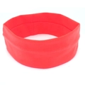 Close-up of a vibrant red elastic yoga headband featuring soft knit fabric and wide design - Fluorescent Pink