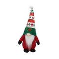 Close-up of a festive plush Christmas gnome with a red snowflake hat and white beard - Male Style