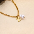 Elegant gold chain necklace with a letter Z pendant and unique Baroque pearl - Letter Z Necklace