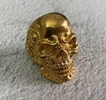 Retro hip-hop men's skull ring in polished golden finish with ornate embossed patterns - US 7 / Gold