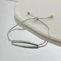 Minimalist adjustable silver bracelet with polished GOOD LUCK engraved metal bar charm - Silver Good Luck Bar