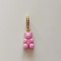 Detail of pink resin gummy bear pendant with gold clasp and sparkling zirconia stones - Sweet Pink