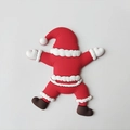 Cute Santa Claus soft rubber cake topper in red and white outfit for festive parties - Soft Plastic / Lying Santa Claus
