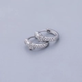 Detailed macro view of S925 sterling silver star hoop earrings with zircon crystals - Star Hoop - Silver