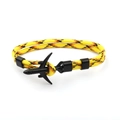 Braided paracord bracelet with a black airplane fastener in yellow and orange patterns - Black Airplane Buckle / Yellow Camouflage