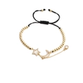 Bracciale regolabile dorato con stella e luna, zirconi e cordino nero intrecciato - Stella Luna con corda nera