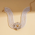 Detail view of a six-layer faux pearl necklace with a large crystal cluster pendant - Necklace - Gold