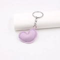 Detail of a purple PU leather heart keychain with visible stitching and silver metal ring - Taro Purple