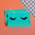 Set of two teal eyelash EVA zipper bags for makeup storage on orange background - Lake Blue Eyelash Zipper Bag