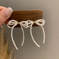 Elegant bow pearl tassel earrings with silver needle and gold metal accents for women - White
