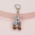 Cute acrylic rabbit keychain with a bunny on a motorcycle and silver lobster clasp - Rabbit on Scooter