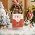 Santa Claus themed Christmas gift box with golden handle and festive cartoon design - Red