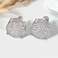 Macro shot of silver circular earrings featuring full pavé set clear cubic zirconia stones - Silver (CJBE067 White Gold White Zirconia)