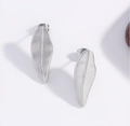 Pair of silver leaf-shaped stainless steel stud earrings with detailed vein texture - Steel Color Leaf EI09-10