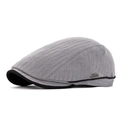 Grey herringbone newsboy cap for men with stylish metal logo and black trim - Light Gray
