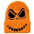 Close-up of bright orange knit beanie featuring a black spooky skull face pattern - Orange Funny Skull Expression Style (橙色-D)