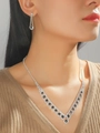 Elegant silver jewelry set with black oval stones and clear diamonds worn by model - Silver Base Black Oval Gem Style (DTN14027052BK)