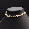 Handmade freshwater pearl necklace with gold wire tassels on a black neck model display - Starry Sky Choker Style