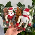 Set of 4 telescopic Christmas pop tube toys featuring Santa, Reindeer, Snowman, and Gingerbread - Set of 4 (Christmas Series Non-Glowing)