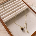 Elegante collana a catena serpente dorata con perla occhio di tigre in una scatola di legno - Collana Regolabile con Ciondolo a Forma di Piccola Fiaschetta con Fiocco e Occhio di Tigre