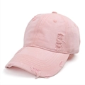 Detailed close-up of pink washed cotton baseball cap with vintage distressed ripped holes - Adjustable / Pink