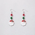 Dettaglio di orecchini natalizi con perle rosse e verdi e ciondoli a forma di Babbo Natale - Babbo Natale Perline Rosse Verdi Gancio Argento