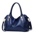 Deep blue lychee textured PU leather handbag for women with metallic accents and strap - Royal Blue
