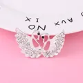 Silver swan brooch accessory with white crystals and black gem eyes, size 47mm x 28mm - D1013 White Swan