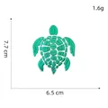 Detailed embroidery patch of a green sea turtle measuring 7.7cm by 6.5cm on white background - Style 21 Green Sea Turtle Patch