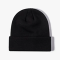 Classic black knit beanie hat with rolled cuff for winter outdoor warmth and comfort - Black