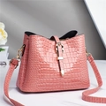 Pink crocodile pattern patent leather bucket tote bag with gold hardware and shoulder strap - Pink