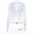 Detail of white lace crop top with intricate floral pattern and front tie-up design - S / White