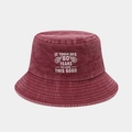 Detailed embroidery on burgundy washed cotton bucket hat with funny 80th birthday slogan - 80 Years Old Birthday Style / Burgundy