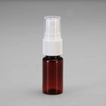 Refillable amber plastic spray bottle with a white pump and transparent protective cap - 15ml / Amber Bottle White Spray