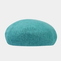 Detailed view of the fine knit texture and plush angora rabbit fur of this teal beret hat - Malachite green