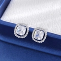 Macro view of silver halo stud earrings with cushion-cut stones and crystal pavé details - Square Sugar Style - White K (A-931)
