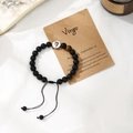 Detail of Virgo zodiac beaded bracelet with matte black beads and tiger eye stone - Virgo