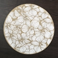 Round natural jute placemat with white floral print on dark wood surface - 38cm / White Butterfly Orchid