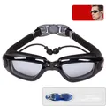 Black anti-fog swim goggles with integrated silicone earplugs and blue storage case - Transparent Black