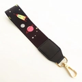 Space theme strap with rocket and planet patterns on black fabric with gold metal clasp - Planet Black