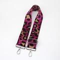 Detail of leopard print wide fabric strap with silver metal swivel hooks and adjuster - Rose Red With Silver Buckle