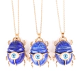 Three gold scarab necklaces with blue lapis lazuli stone and evil eye detail - Lapis Lazuli (No Chain)