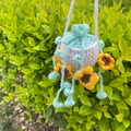 Handmade crochet hanging plant basket with blue flowers for car rearview mirror decor - Mint Green Leaves + Sunflower