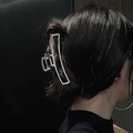 Minimalist silver metal hair claw clip in rectangular hollow design shown on model - Silver Square Hollow(FJ137)