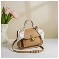 Detail of khaki PU leather handbag with silk scarf wrap and golden metal clasp - Khaki