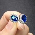 Elegante Ohrstecker mit blauem Saphir und weißem Diamantumrandung auf Versilberung - Ohrstecker (1 Paar)