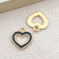 Golden heart-shaped pendant with black enamel inlay for DIY jewelry crafting - 1Pc Black Heart Shape Charm 14x15mm