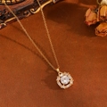 Macro view of gold sunflower pendant with sparkling white zircons on O-chain necklace - Gold Rounded Square White Zirconia Necklace(T031)