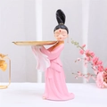 Ancient lady figurine in pink dress holding a golden tray for key storage - Pink Lady
