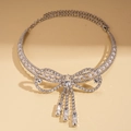 Detail of silver bowknot tassel necklace with rhinestones and imitation pearls - Silver